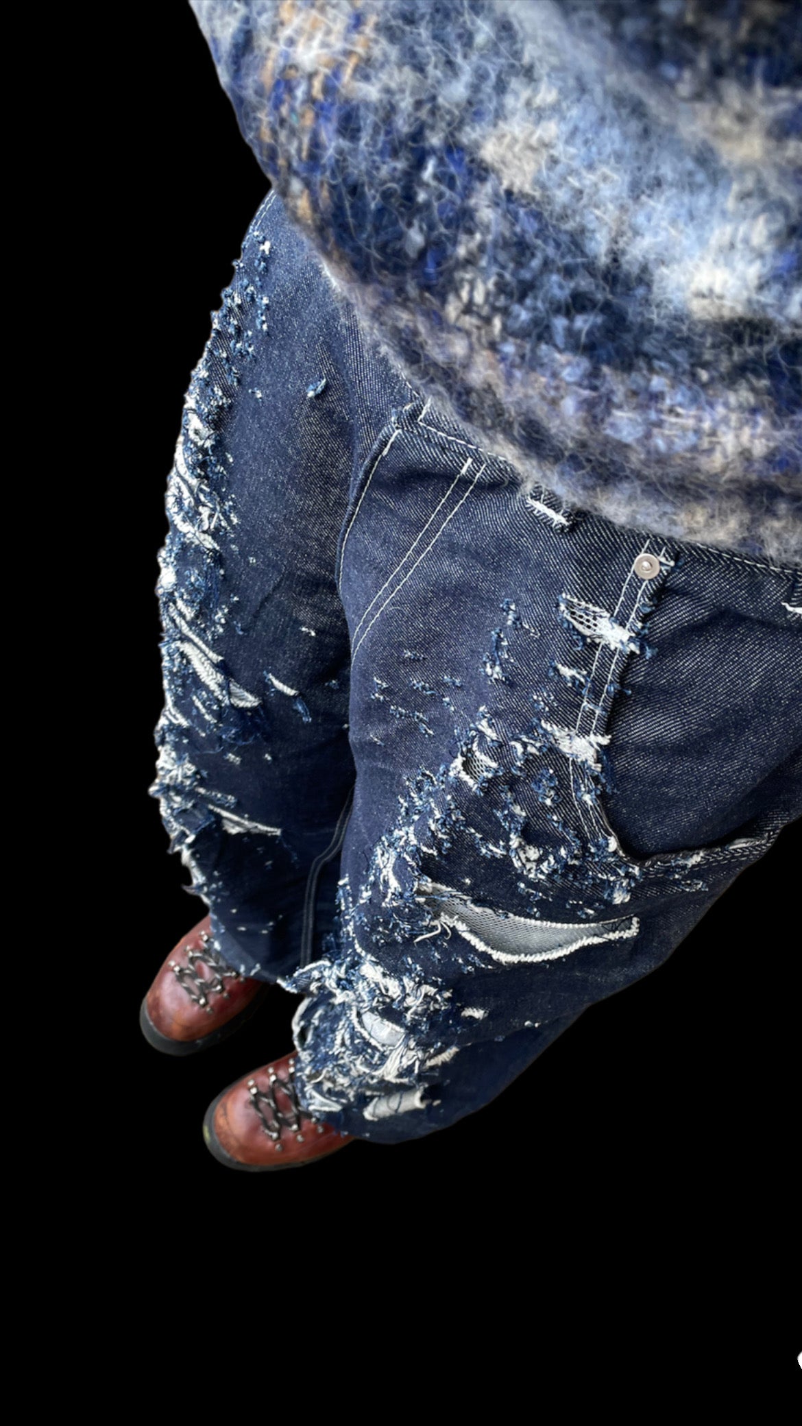 Distressed “lace” jeans