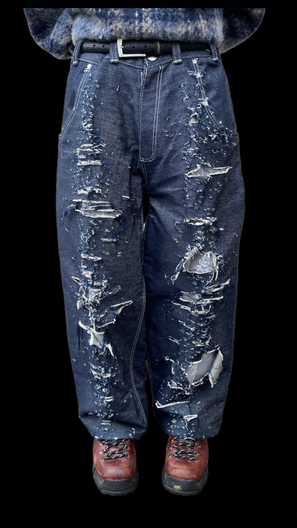 Distressed “lace” jeans
